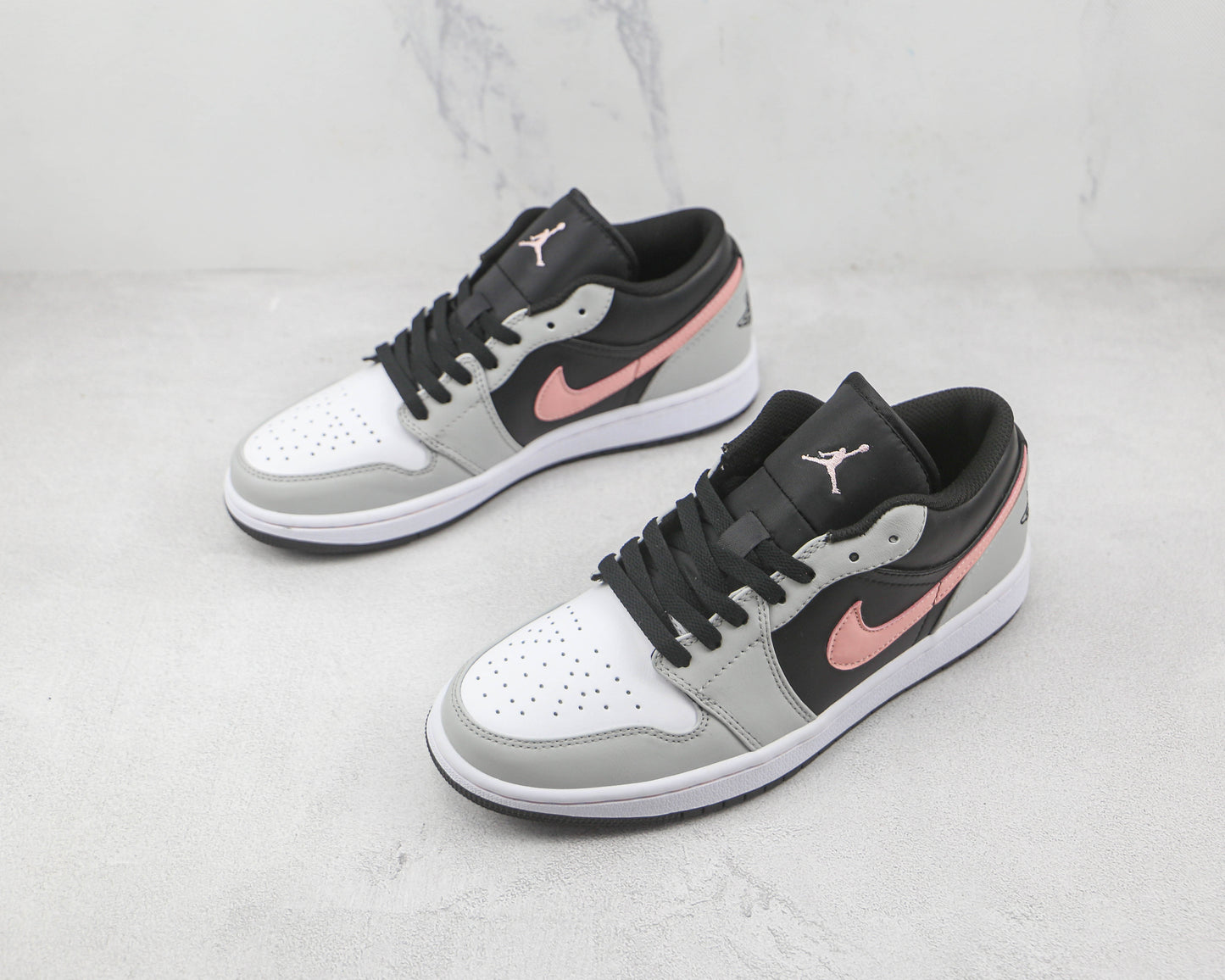 Jordan 1 Low Schwarz Grau Rosa