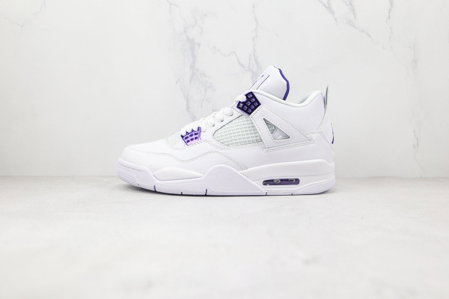 Jordan 4 Retro Viola metallizzato 