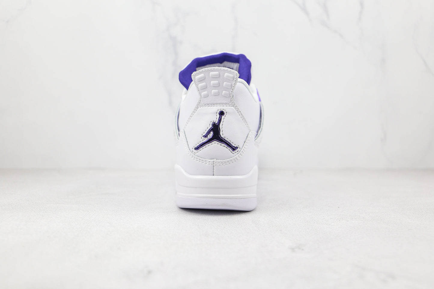 Jordan 4 Retro Viola metallizzato 