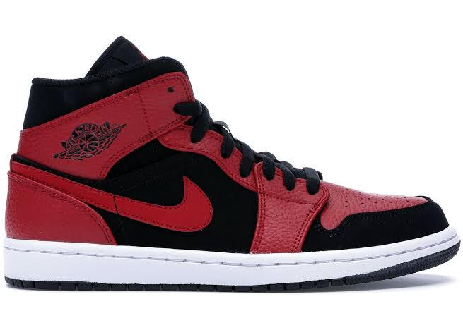 Jordan 1 Mid Reverse allevata 