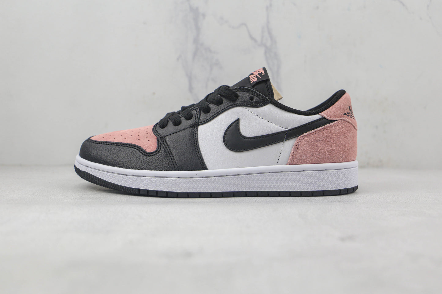 Jordan 1 Low Corallo Sbiancato 