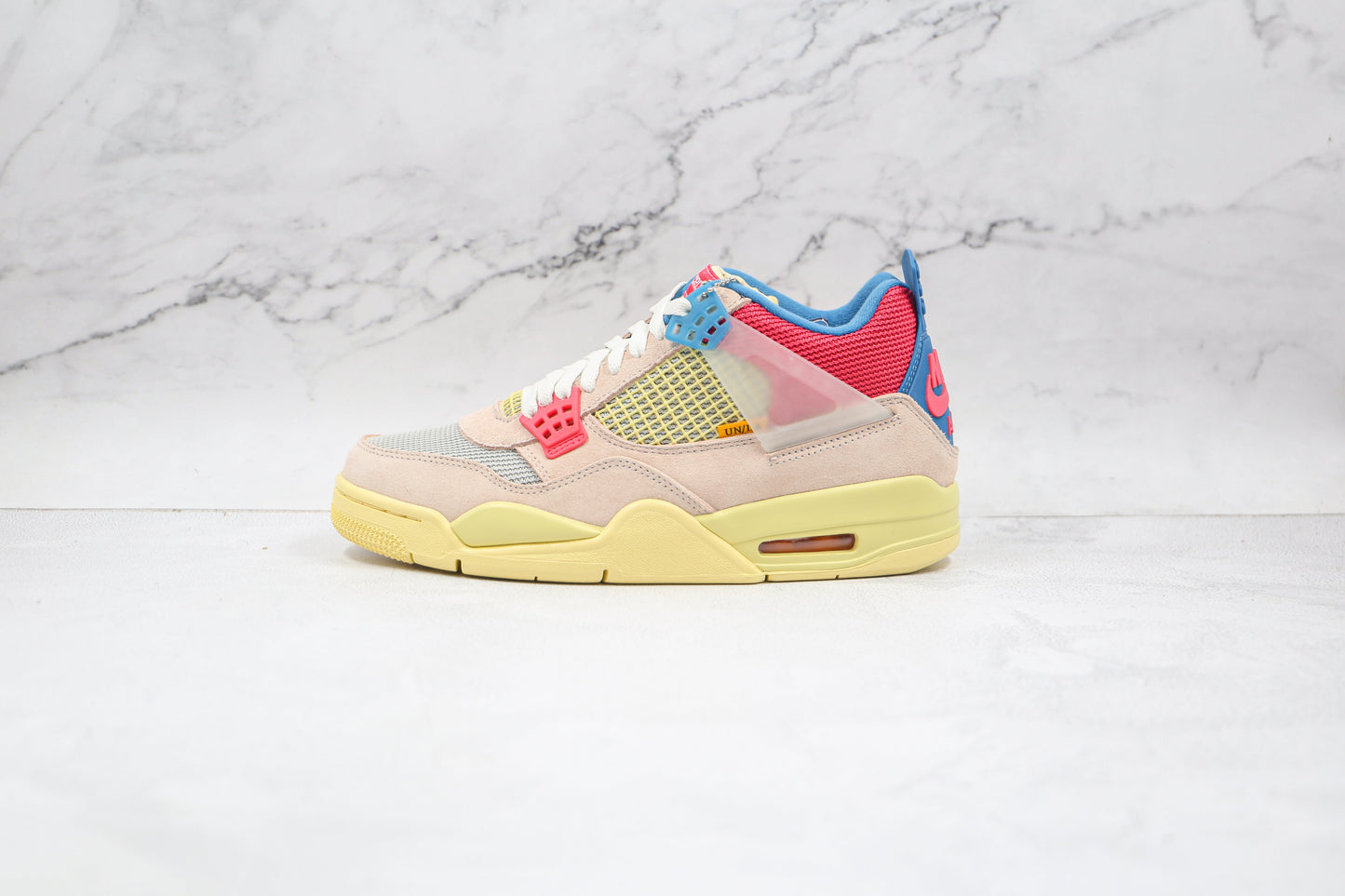 Jordan 4 Retro Union Guava Ghiaccio 