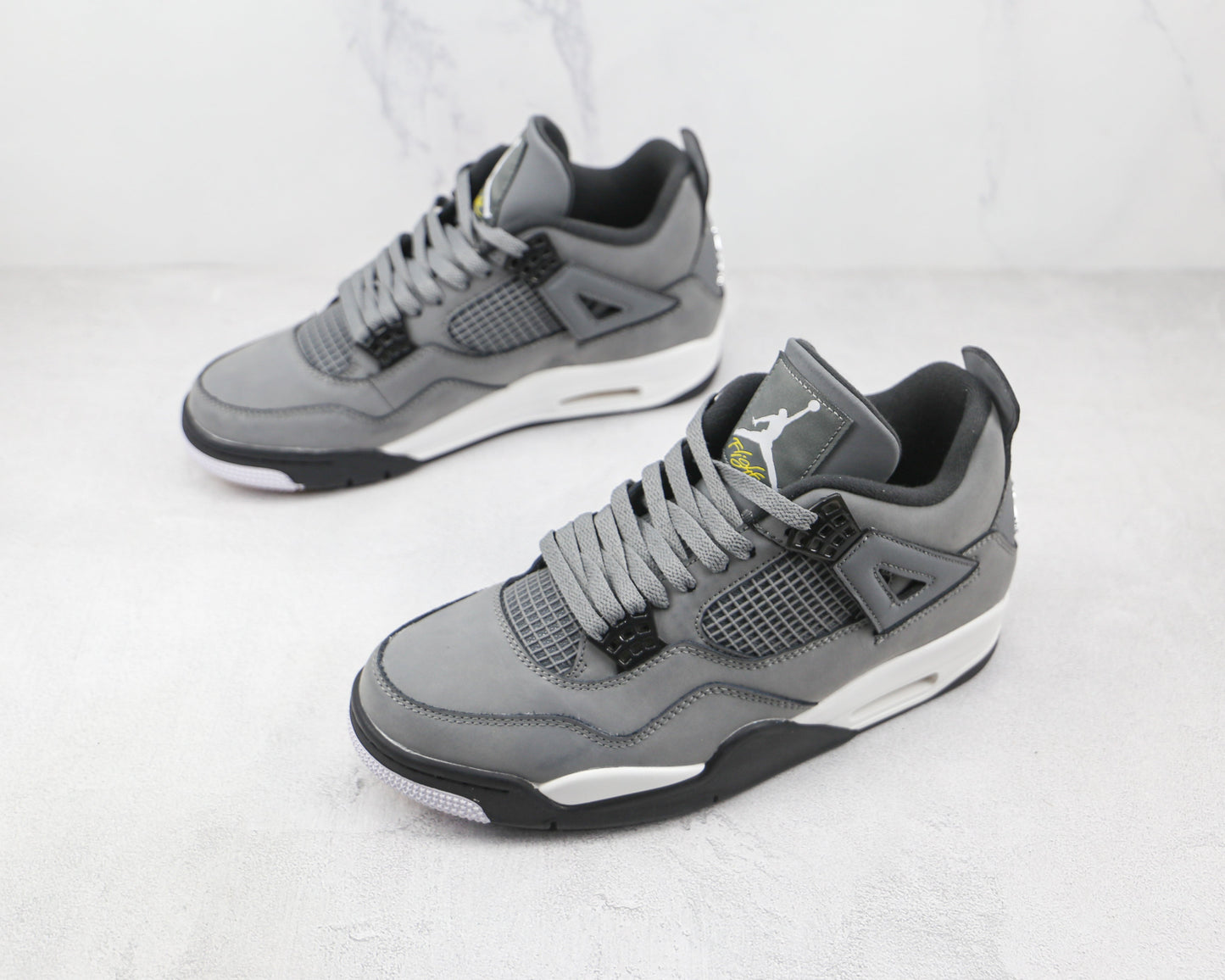 Jordan 4 Retro Grigio Freddo 